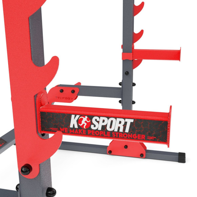 An exercise bench with a set of barbells and weights