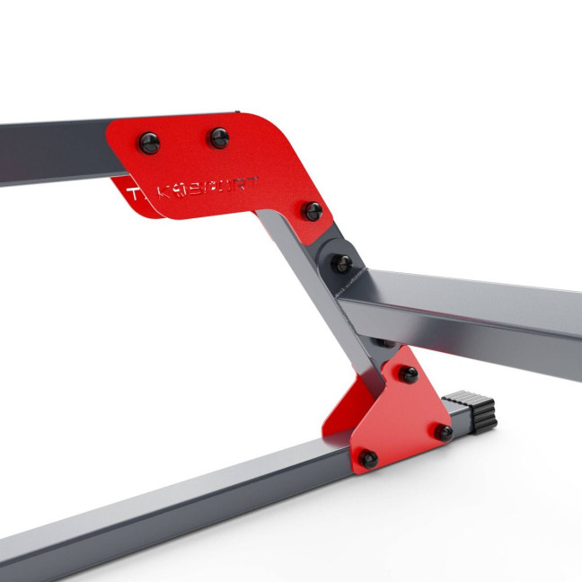 An exercise bench with a set of barbells and weights