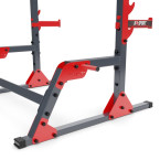 An exercise bench with a set of barbells and weights
